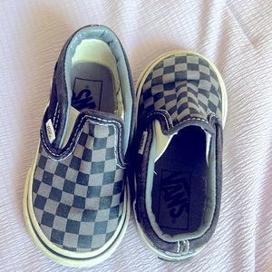 These cute little black and grey slip on vans are a perfect running around shoe.